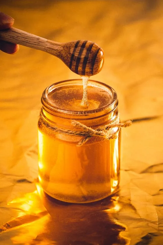 A jar of raw wildflower honey